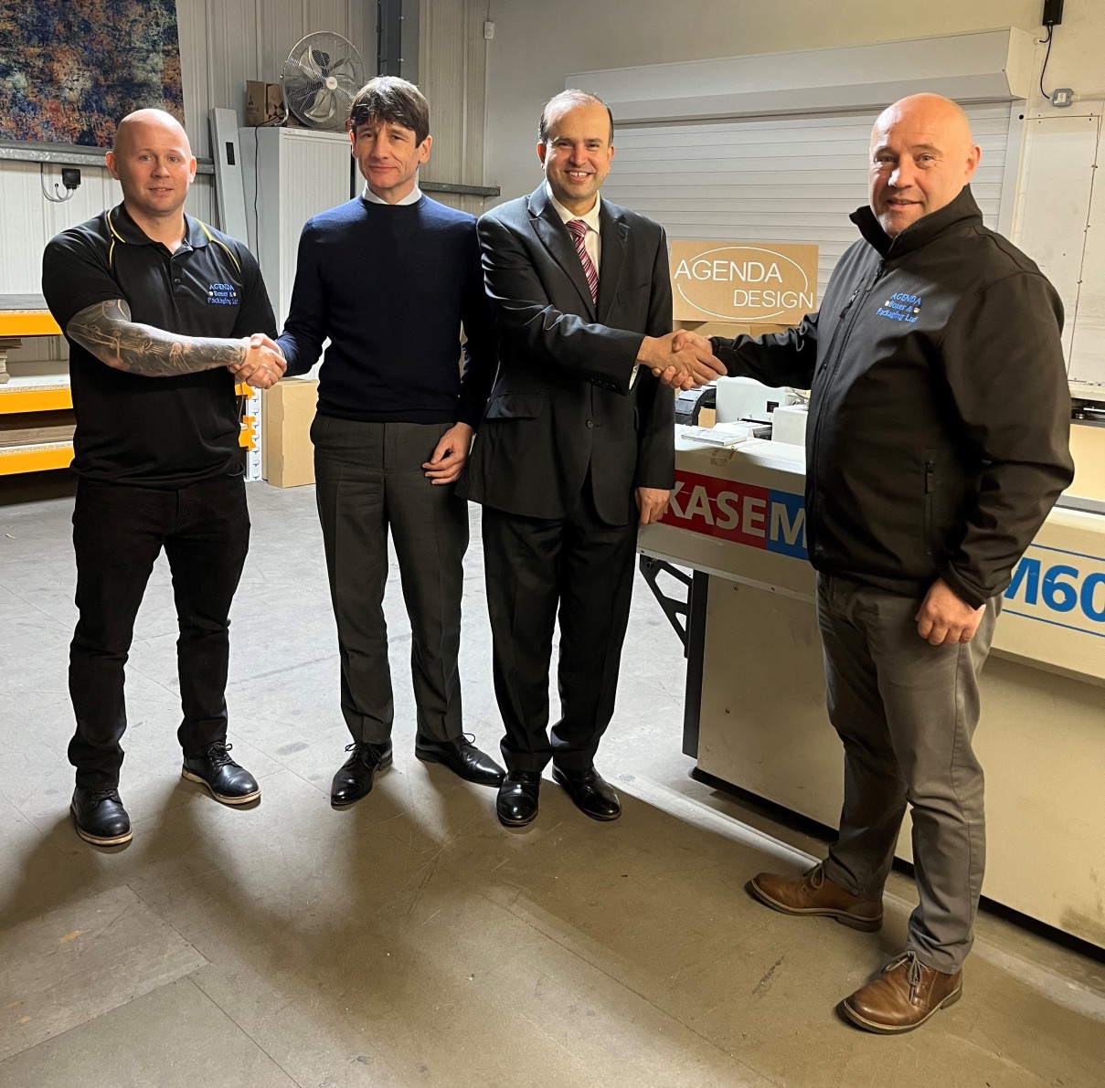 Councillor Asjad Mahmood, Leader of Pendle Borough Council (centre right) and Phillip Spurr, Pendle Borough Council’s Director of Place (centre left) with the directors of Agenda Boxes & Packaging Ltd